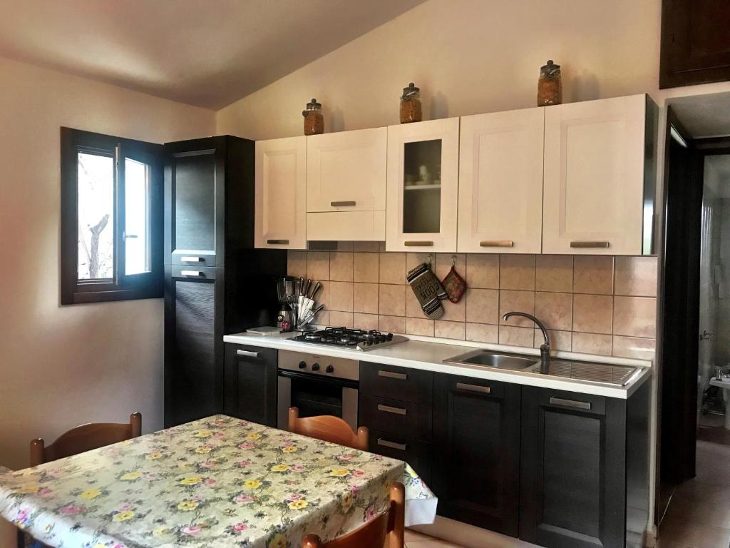 Η κουζίνα ή μικρή κουζίνα στο MP Guest House