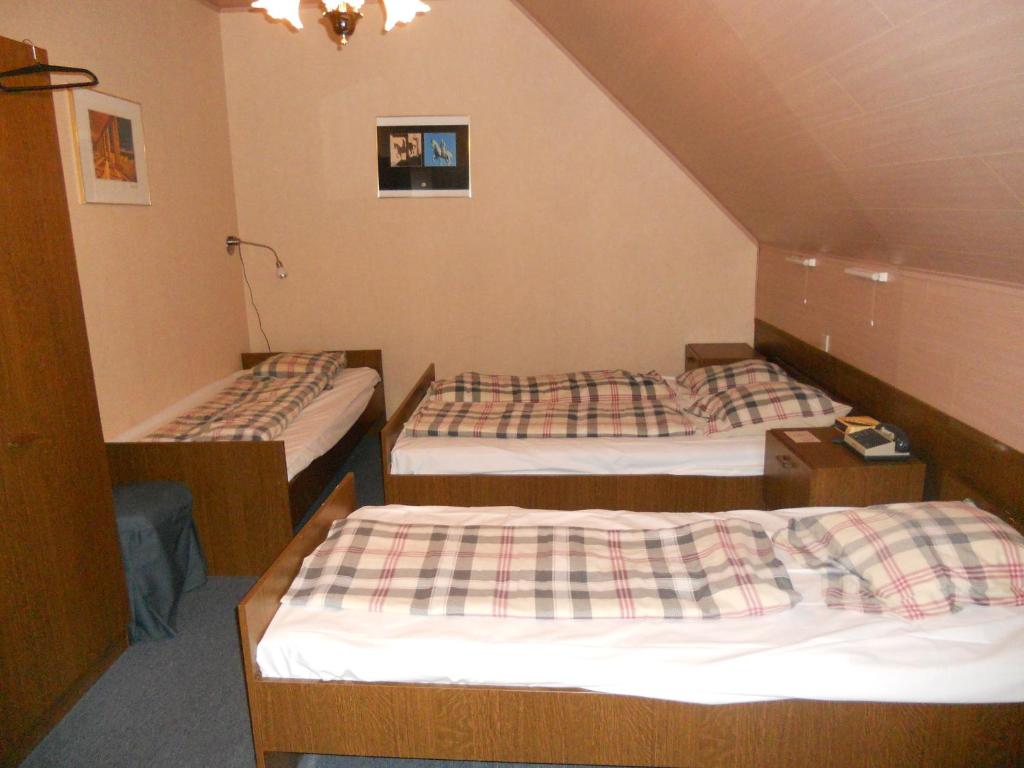 Postel nebo postele na pokoji v ubytování Hotel Ten Putte