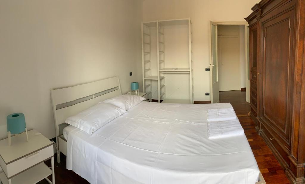 Posteľ alebo postele v izbe v ubytovaní Colosseo Boutique Apartment