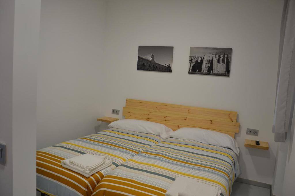 Posteľ alebo postele v izbe v ubytovaní Apartamentos Mk77 León- San Isidoro