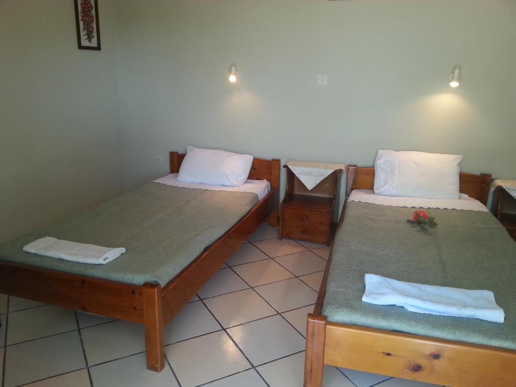 Posteľ alebo postele v izbe v ubytovaní Rigos Apartments