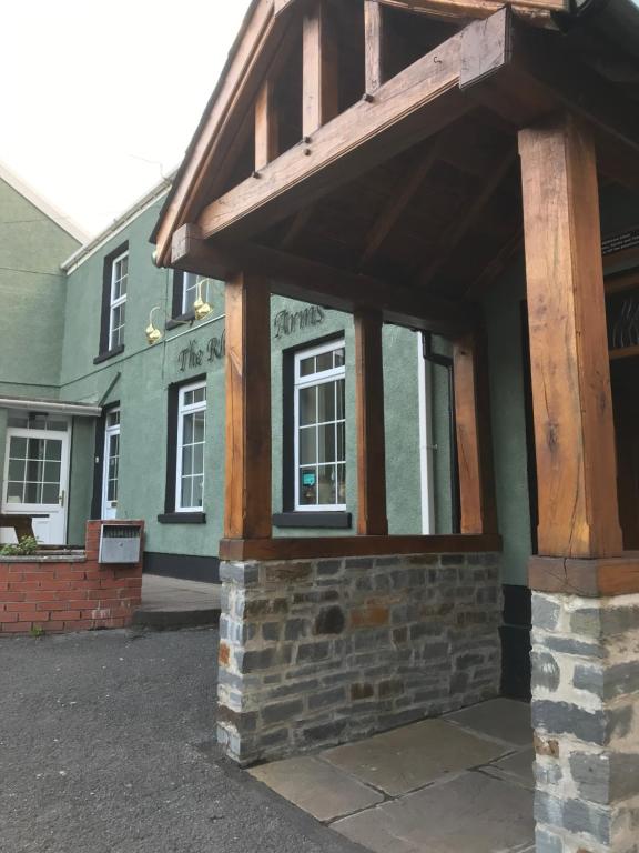 a building with awning on the side of it at Rheolau arms in Swansea