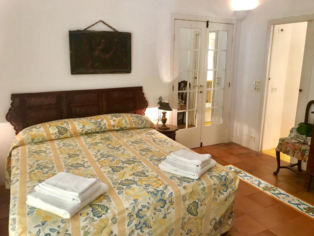 Ένα ή περισσότερα κρεβάτια σε δωμάτιο στο Villa Guya