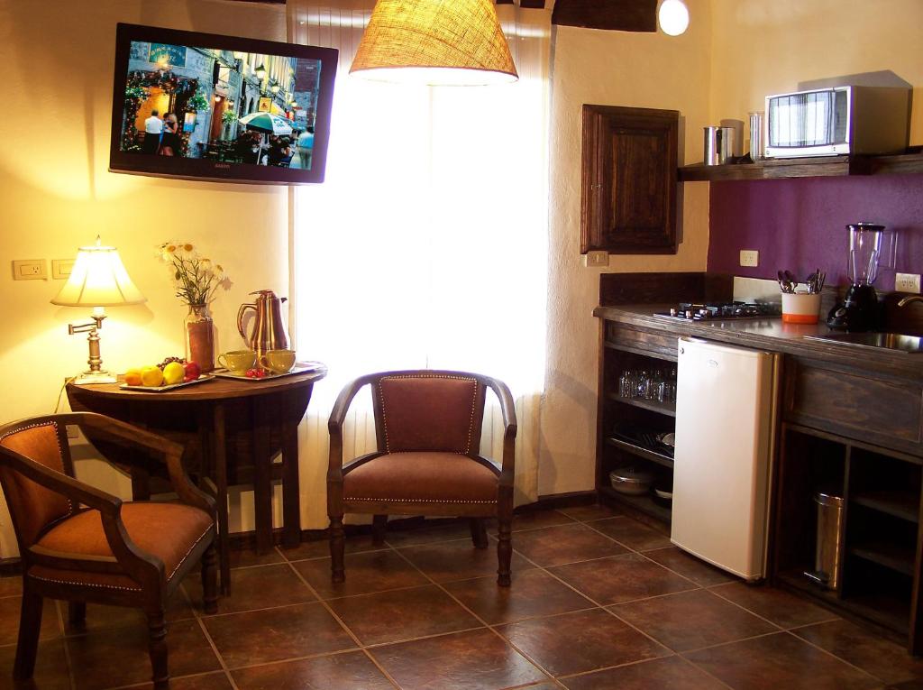 Kuchyň nebo kuchyňský kout v ubytování Hotel Villa Cassis