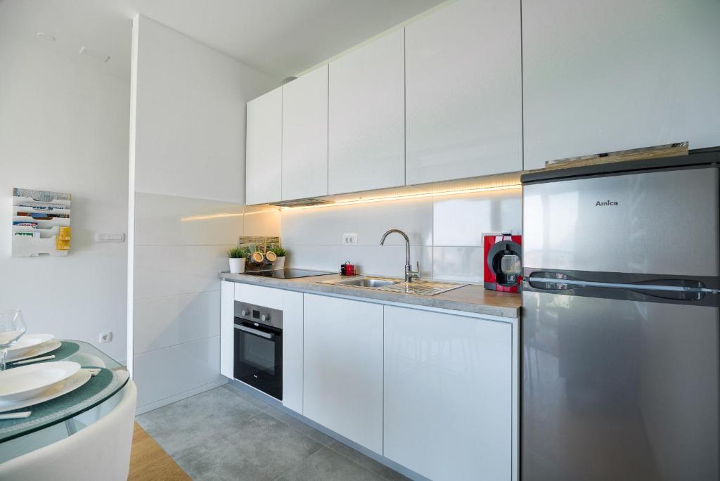 Kuchyňa alebo kuchynka v ubytovaní Apartment StellaMare