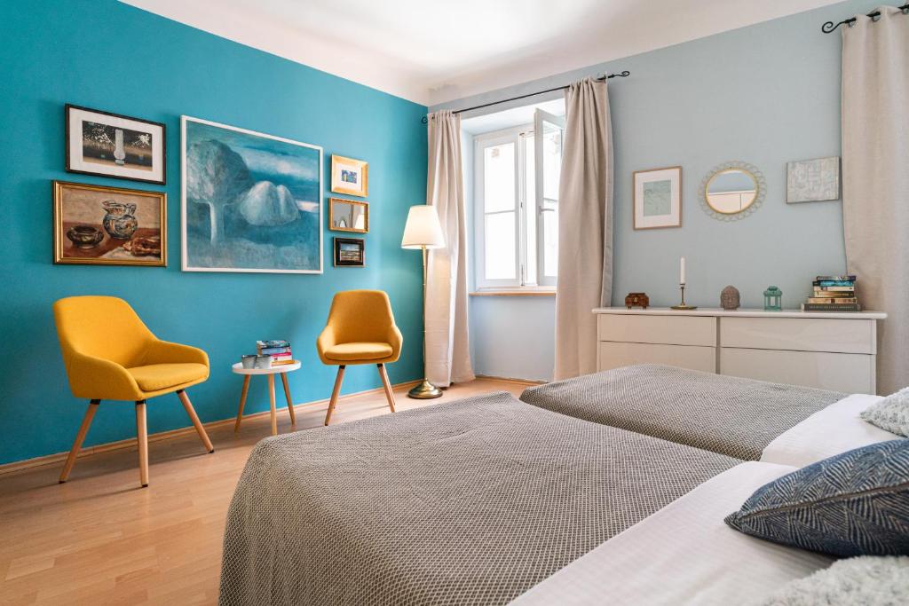 Postel nebo postele na pokoji v ubytování Matteotti 2 Apartment