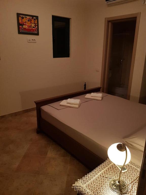 Postel nebo postele na pokoji v ubytování Villa "M Family"