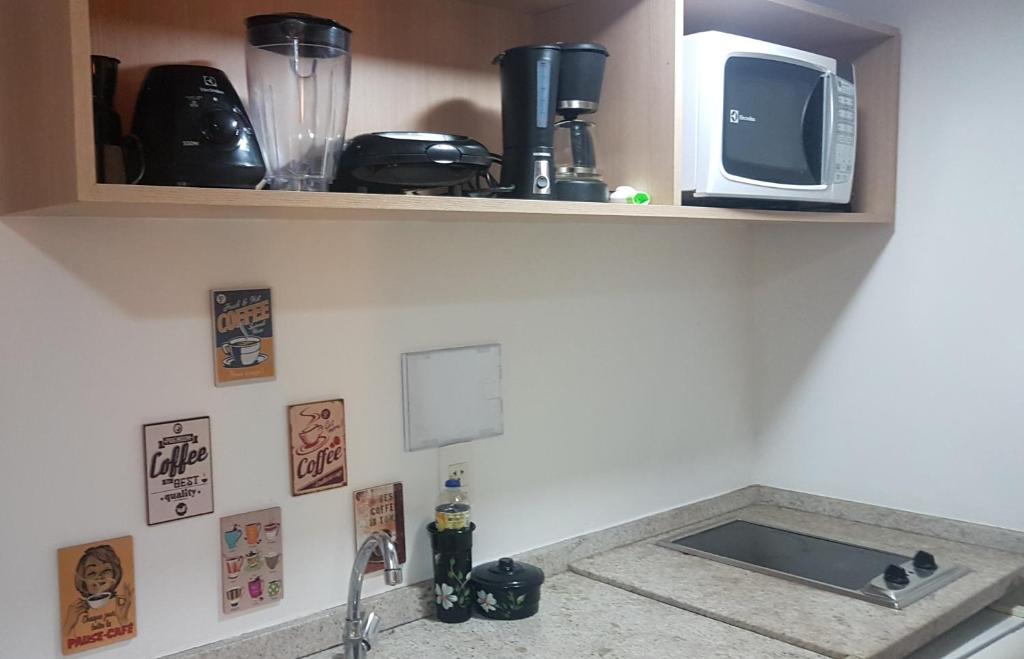 Kuchyň nebo kuchyňský kout v ubytování Flat Manaus