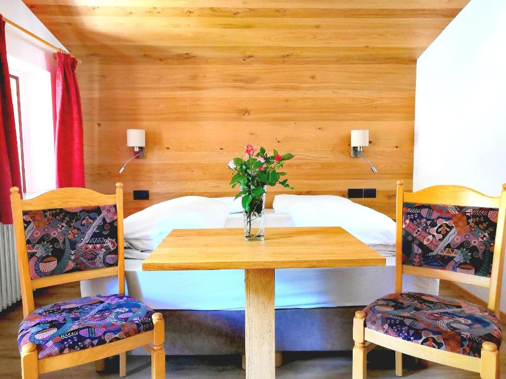 Postel nebo postele na pokoji v ubytování Garni Gabrieli