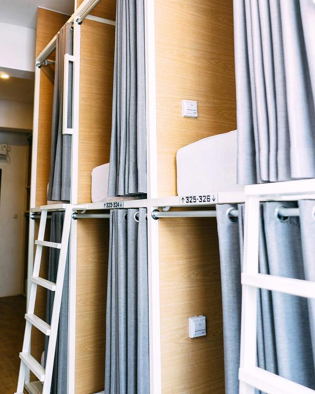Palanda nebo palandy na pokoji v ubytování SO! Boutique Hostel