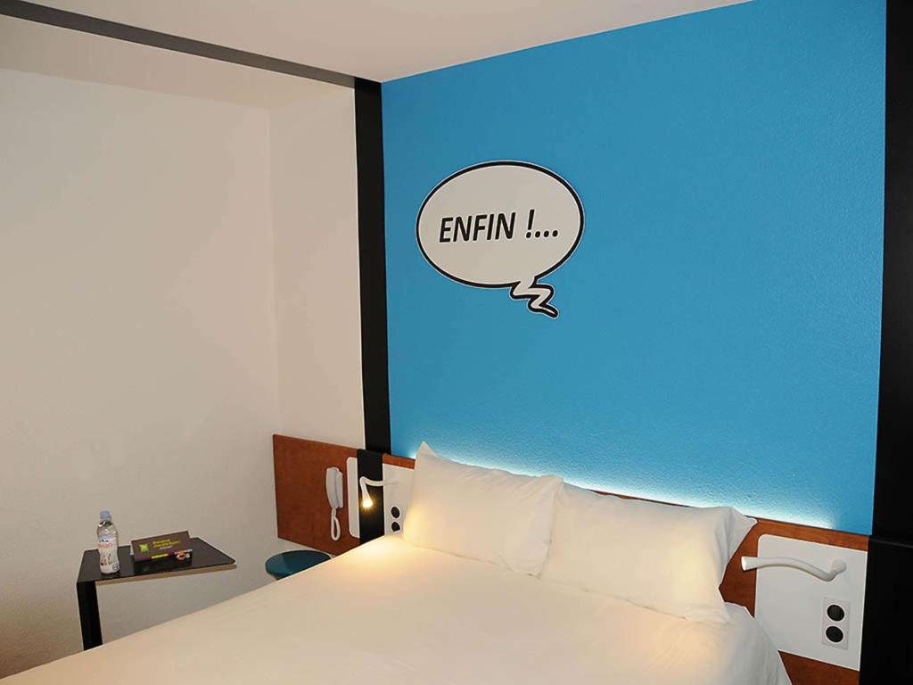 Postel nebo postele na pokoji v ubytování Ibis Styles Chambery Centre Gare