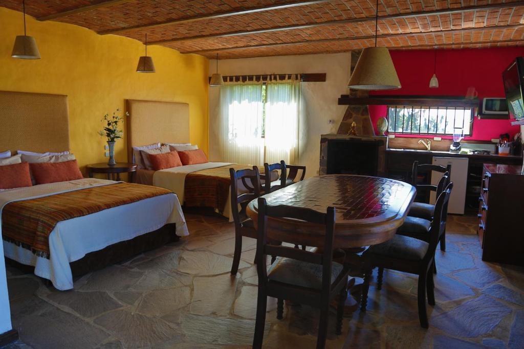 Postel nebo postele na pokoji v ubytování Hotel Villa Cassis