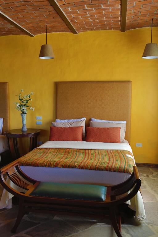 Postel nebo postele na pokoji v ubytování Hotel Villa Cassis