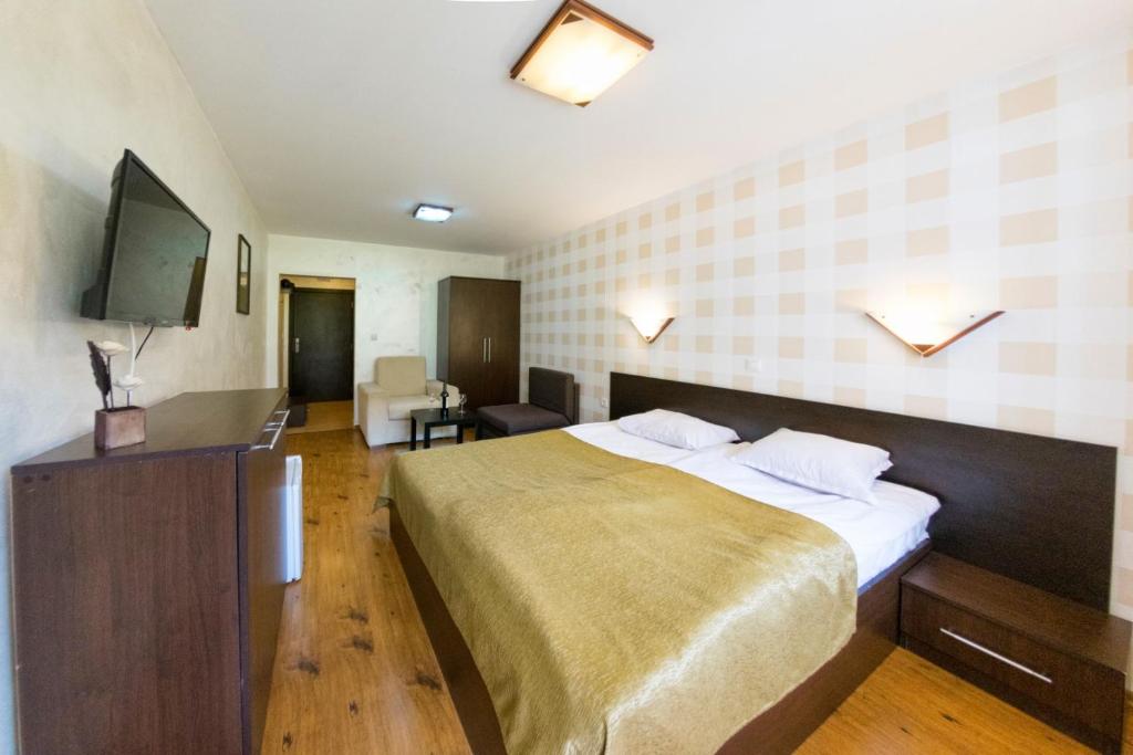 Postel nebo postele na pokoji v ubytování Forest Nook Aparthotel