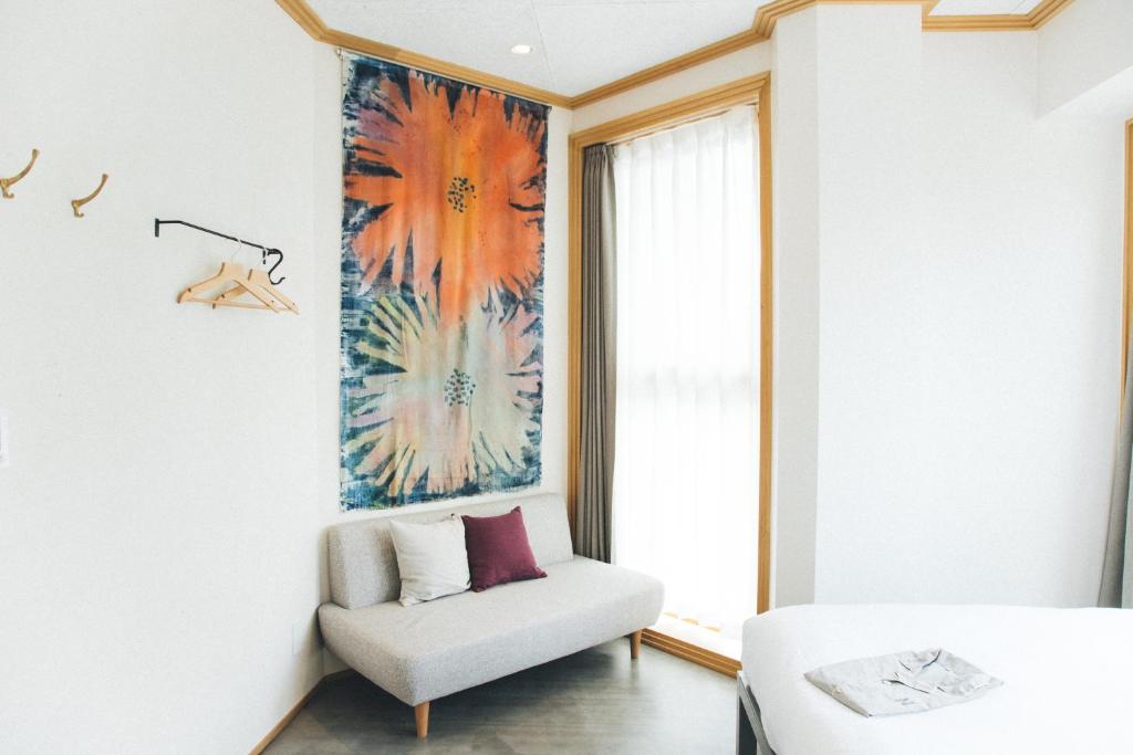 Postel nebo postele na pokoji v ubytování Hotel Noum OSAKA