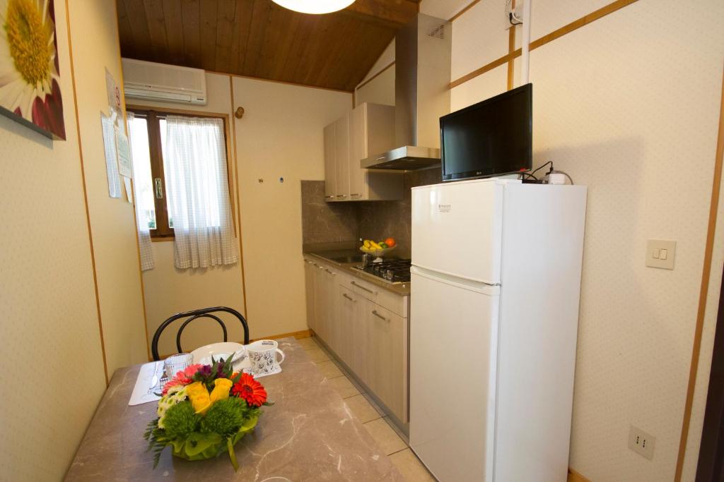 Kuchyň nebo kuchyňský kout v ubytování Camping Santin
