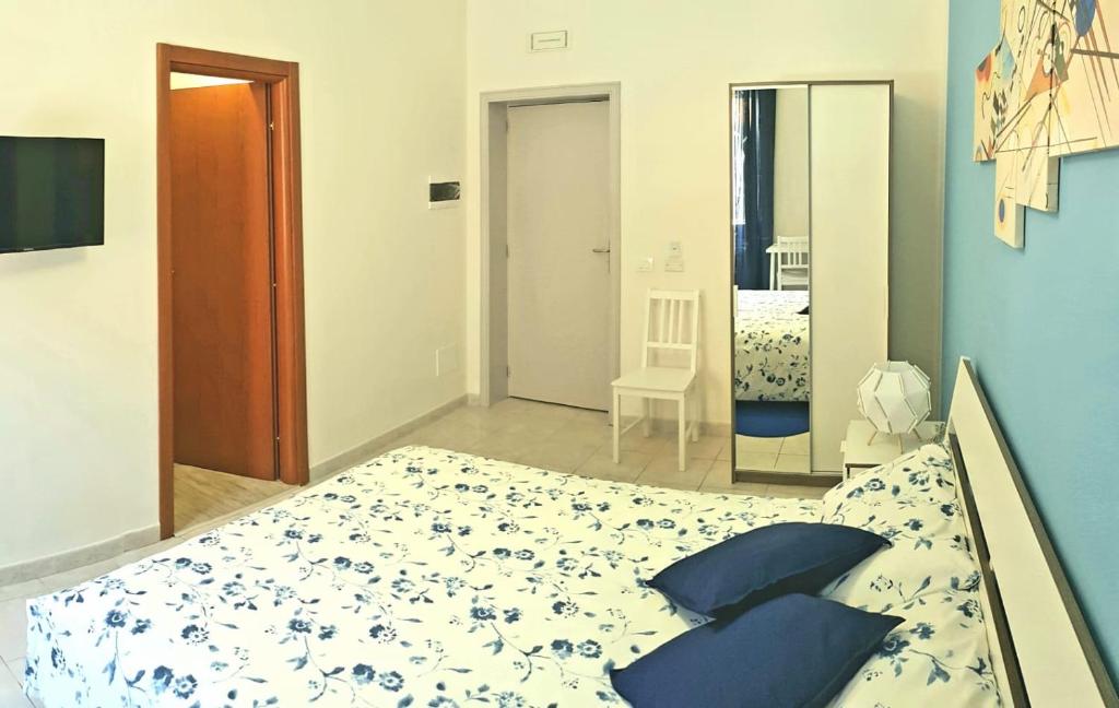 Łóżko lub łóżka w pokoju w obiekcie L'Opera dei Pupi B&b