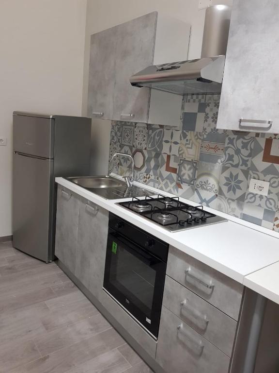 Kuchnia lub aneks kuchenny w obiekcie L'Opera dei Pupi B&b