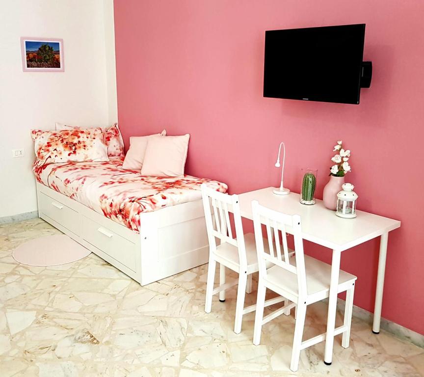 Telewizja i/lub zestaw kina domowego w obiekcie L'Opera dei Pupi B&b