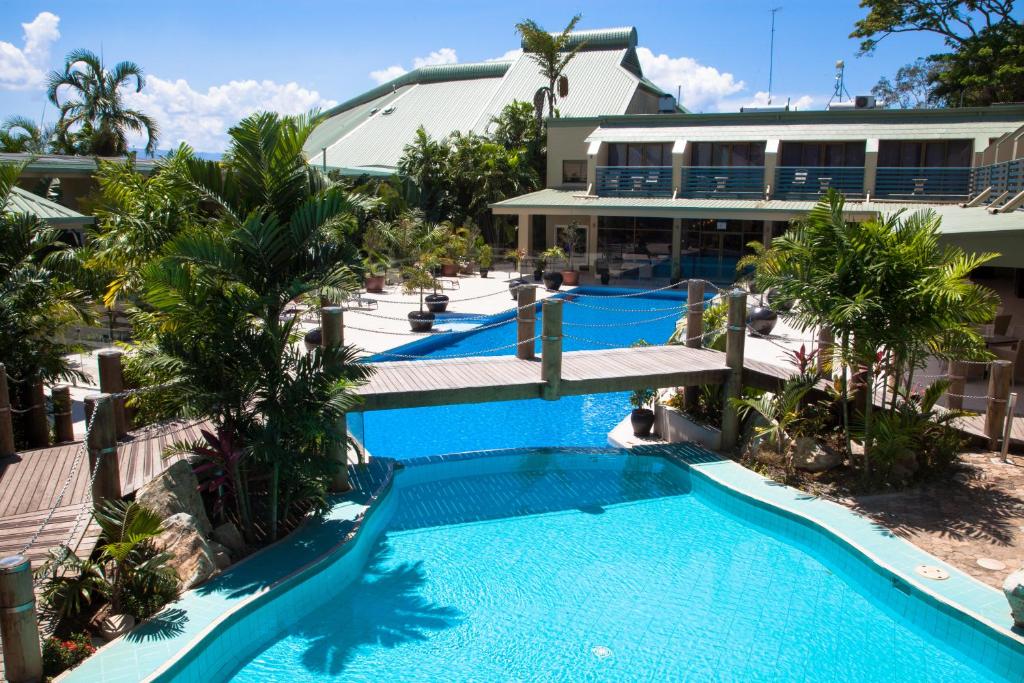 an aerial view of a resort with a swimming pool at Gateway Hotel in Port Moresby