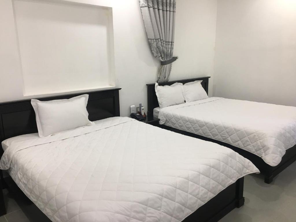 Postel nebo postele na pokoji v ubytování THAO LIEN HOTEL