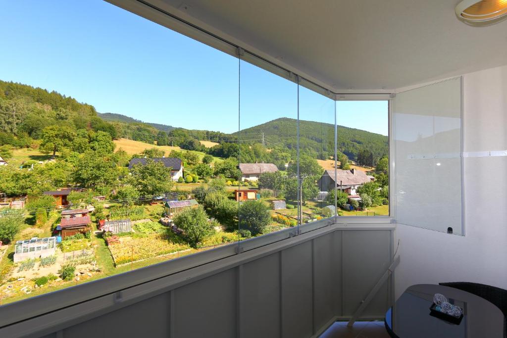 Nespecifikovaný výhled na hory nebo výhled na hory při pohledu z apartmánu
