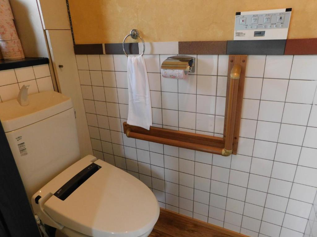 Koupelna v ubytování Guesthouse Shang
