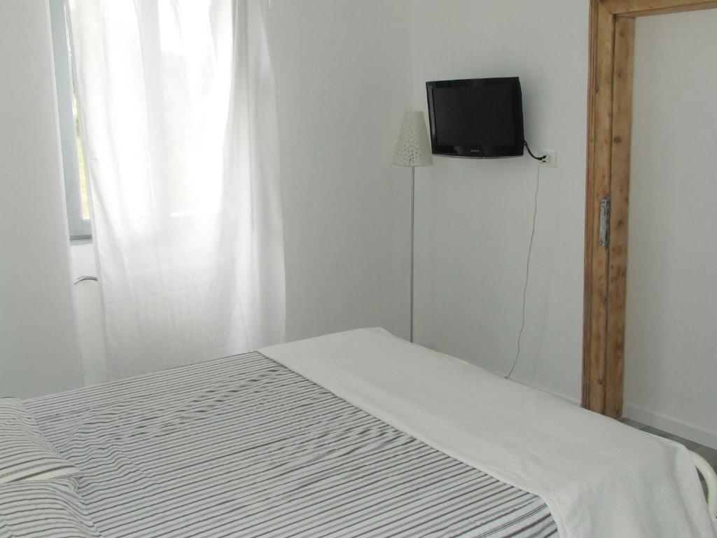 Postel nebo postele na pokoji v ubytování Casa Zucol