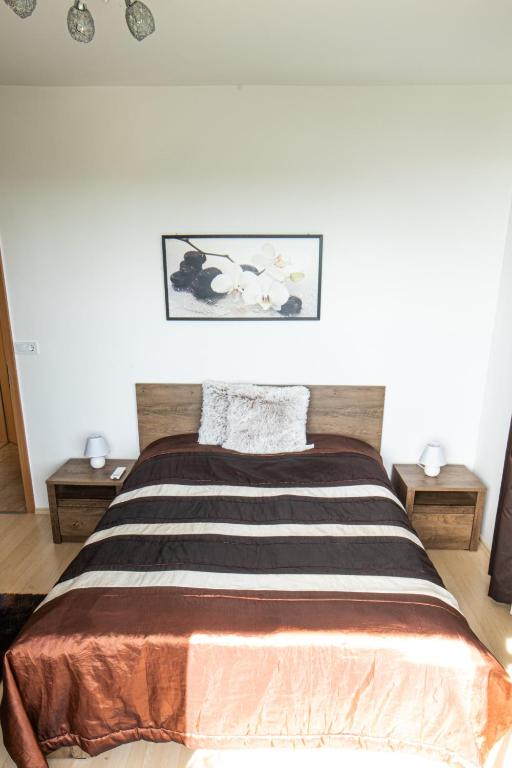 Postel nebo postele na pokoji v ubytování MyFlat Club 218 Palazzo Wellness Apartment