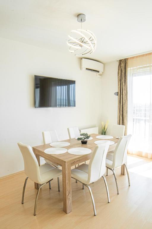 TV a/nebo společenská místnost v ubytování MyFlat Club 218 Palazzo Wellness Apartment