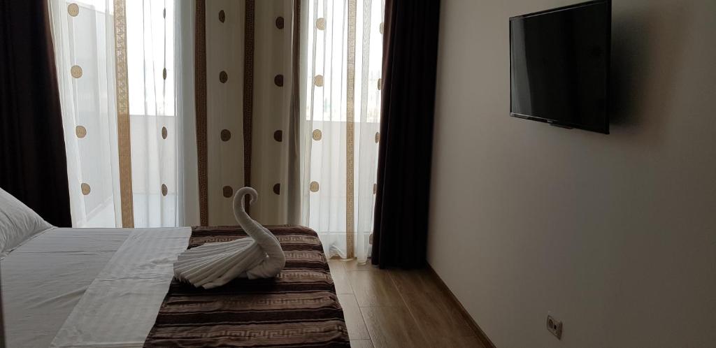 TV a/nebo společenská místnost v ubytování Hotel Solea Beach