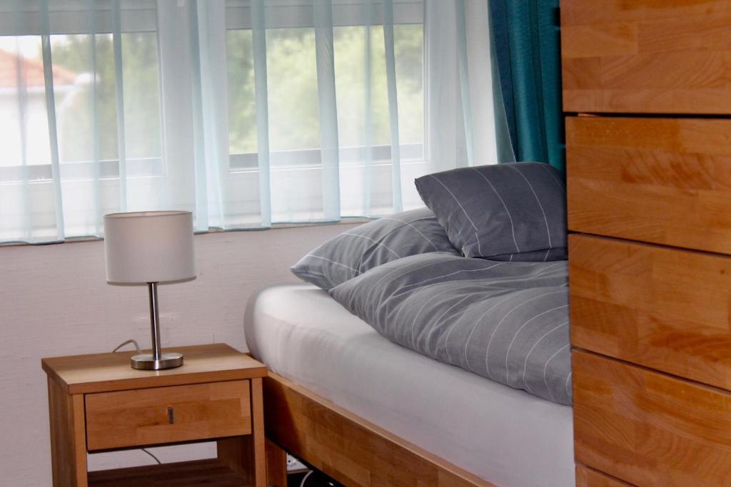 Postel nebo postele na pokoji v ubytování Hotel Donnersberg
