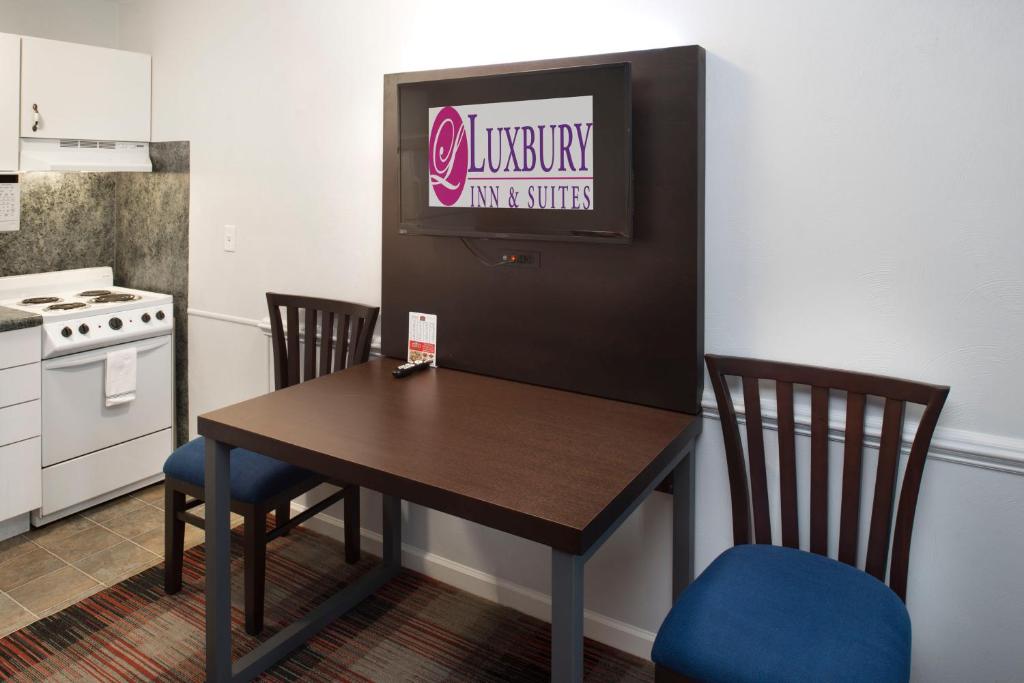 Luxbury Inn & Suites photo