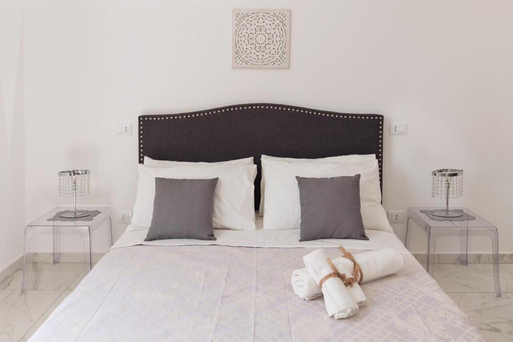 Postel nebo postele na pokoji v ubytování Calafatari B&B