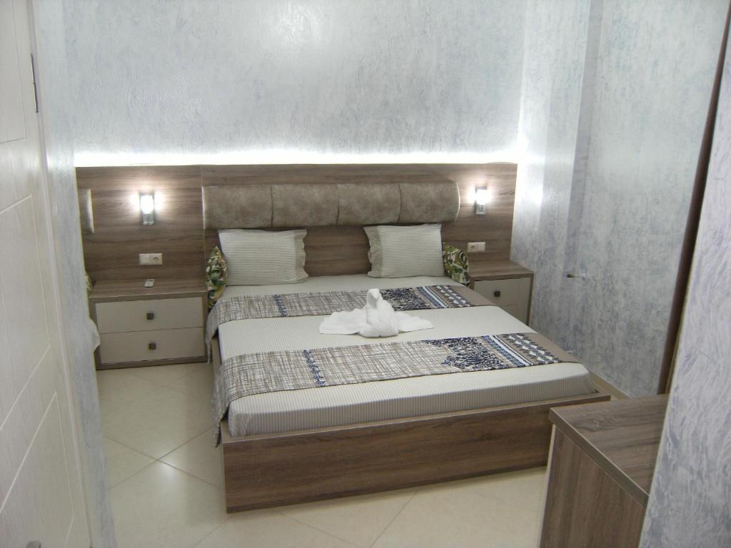 Postel nebo postele na pokoji v ubytování Hotel Ergo