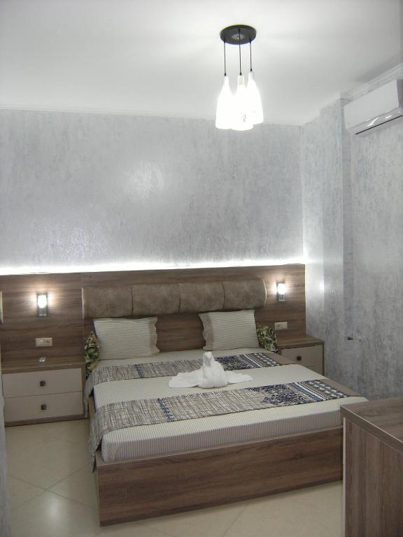 Postel nebo postele na pokoji v ubytování Hotel Ergo