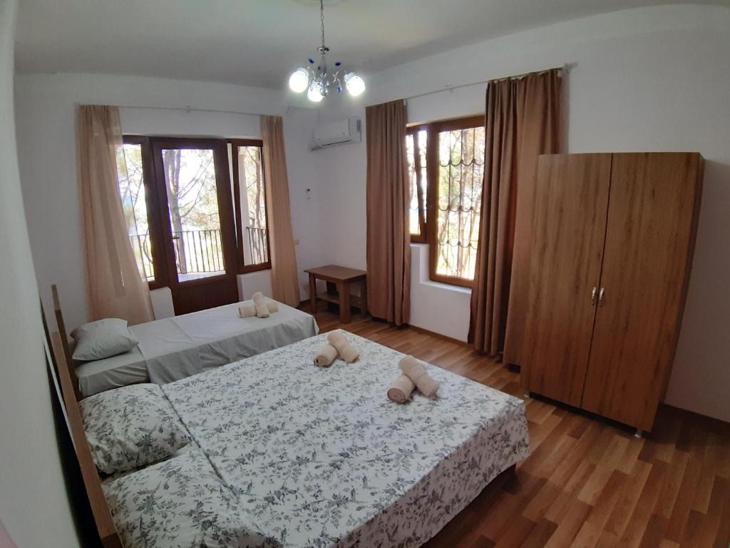 Postel nebo postele na pokoji v ubytování Hotel Niko