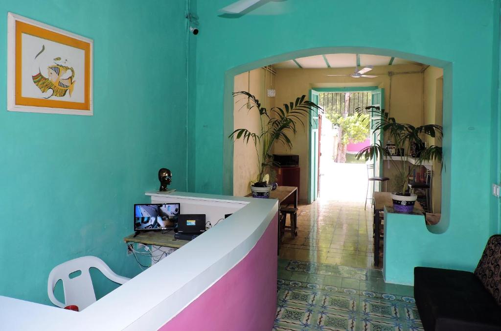 TV a/nebo společenská místnost v ubytování Guaya Hostel
