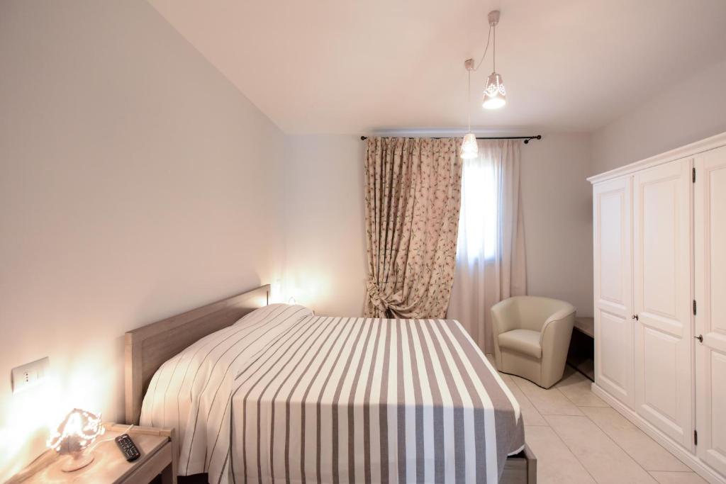 A bed or beds in a room at Terra Mater - Exclusive Cottage -