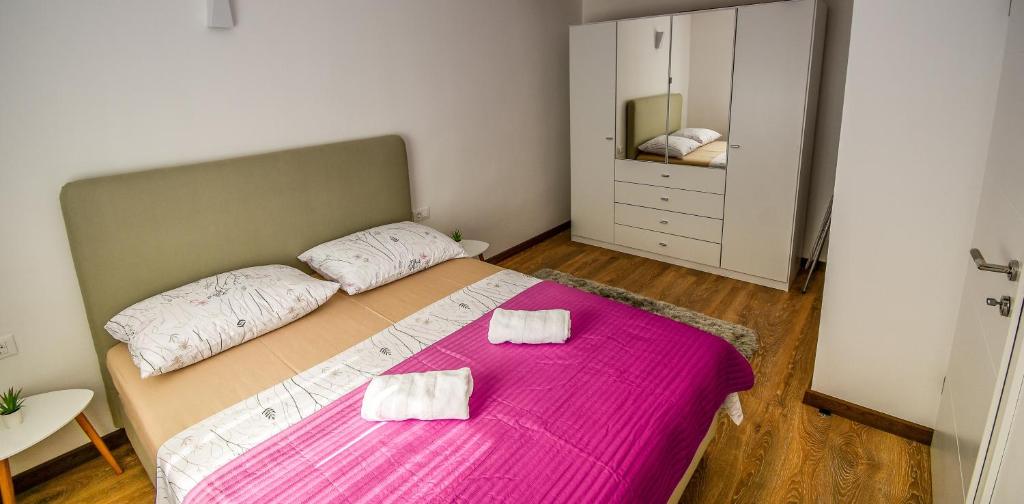 Postel nebo postele na pokoji v ubytování Holiday house ISA