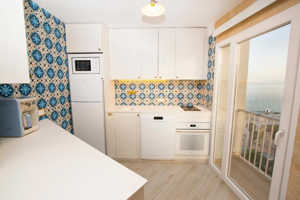 Kuchyň nebo kuchyňský kout v ubytování LOFT PLAYA SALINAS CALPE, Grupo Terra de Mar, alojamientos con encanto