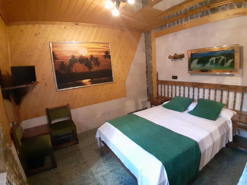 Postel nebo postele na pokoji v ubytování Picon del Conde