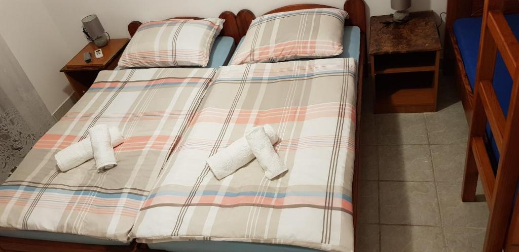 Posteľ alebo postele v izbe v ubytovaní Apartmani Lupi M&S 3