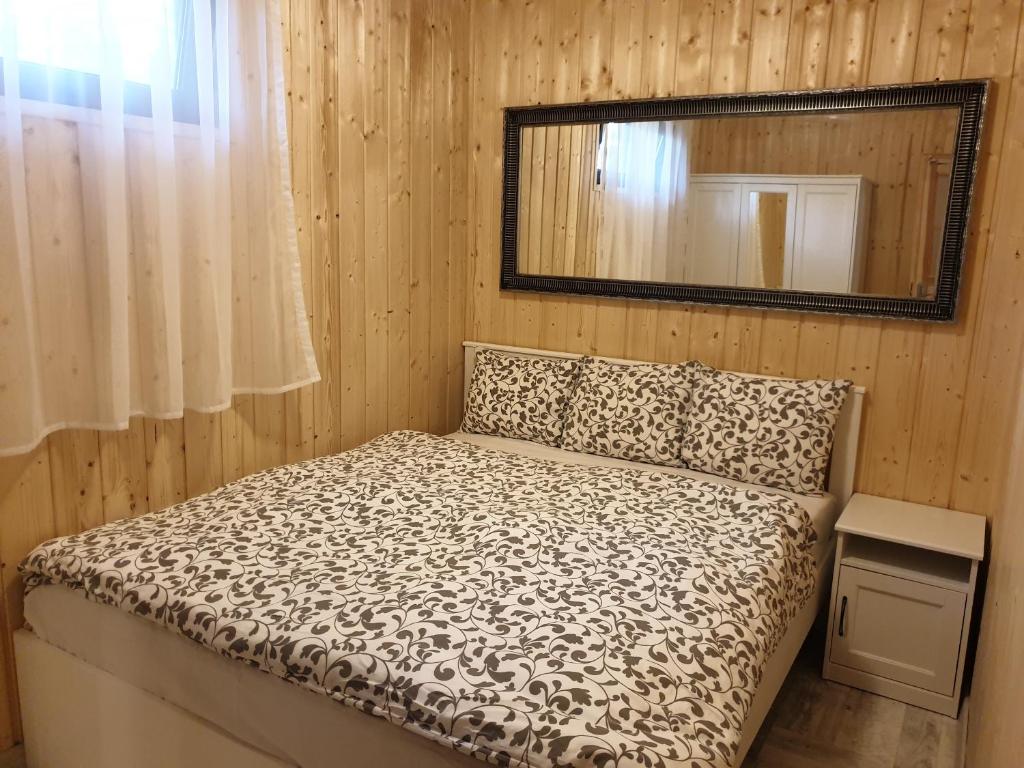 Postel nebo postele na pokoji v ubytování Domki Tęcza
