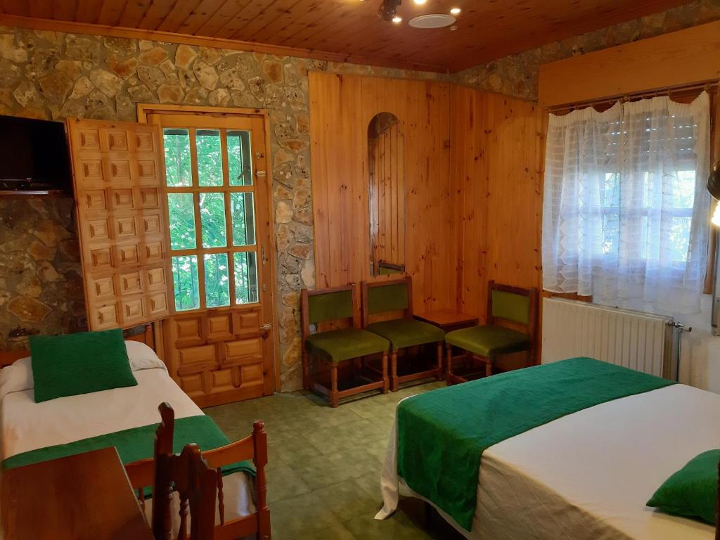 Postel nebo postele na pokoji v ubytování Picon del Conde