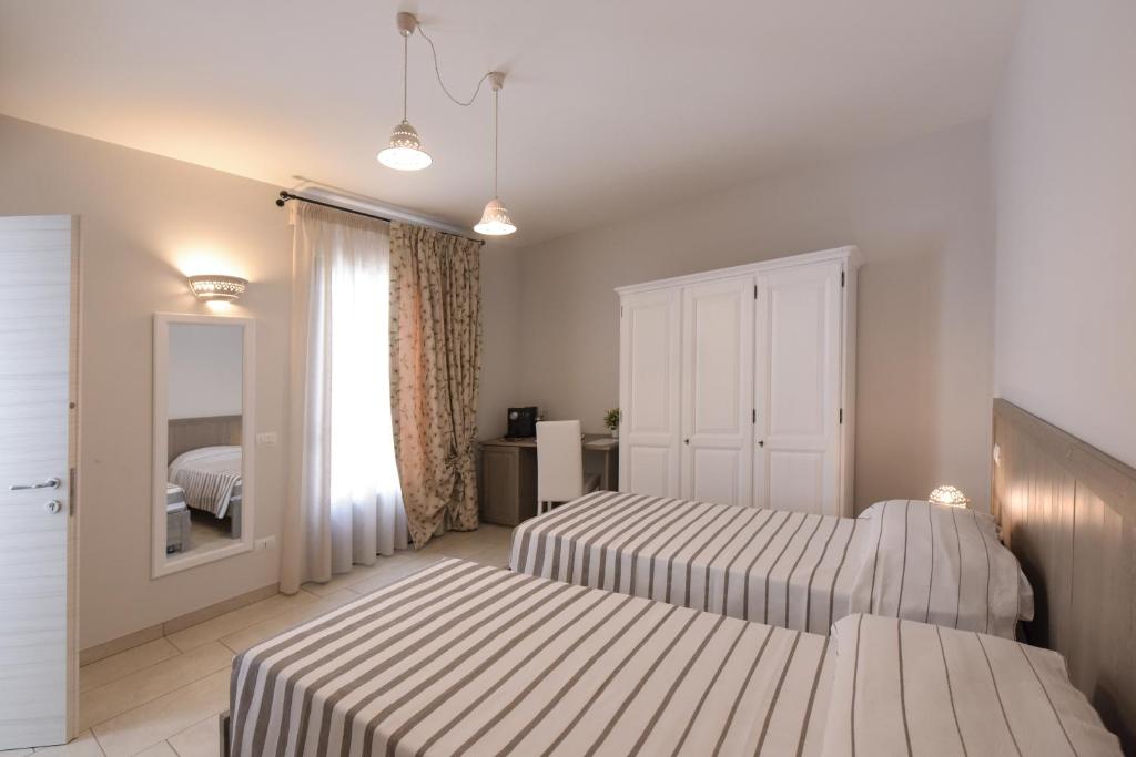 A bed or beds in a room at Terra Mater - Exclusive Cottage -