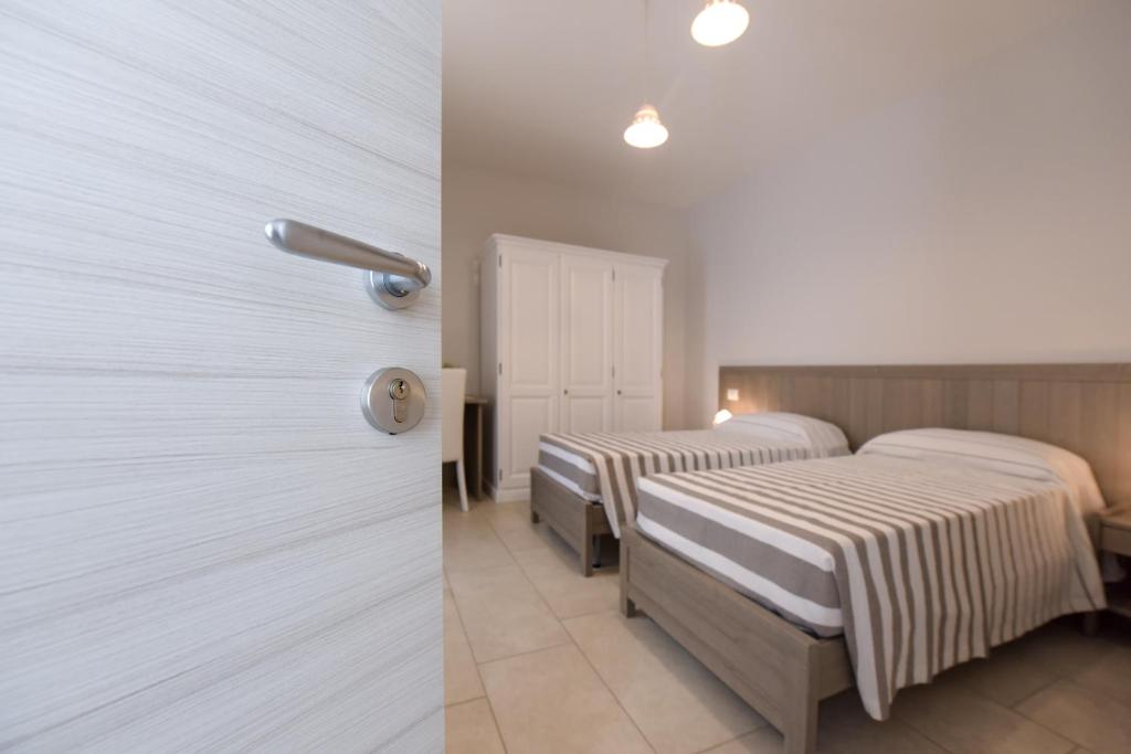A bed or beds in a room at Terra Mater - Exclusive Cottage -
