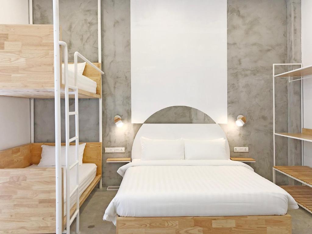 Postel nebo postele na pokoji v ubytování HOOD Hostel