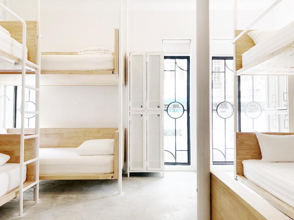 Postel nebo postele na pokoji v ubytování HOOD Hostel