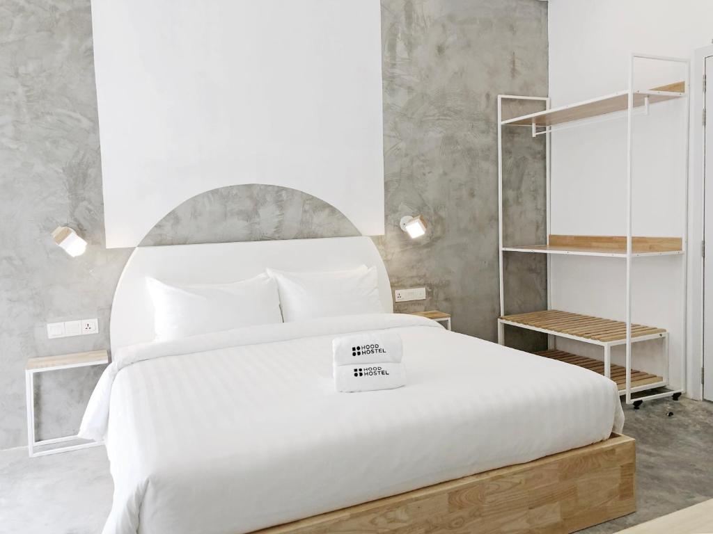 Postel nebo postele na pokoji v ubytování HOOD Hostel